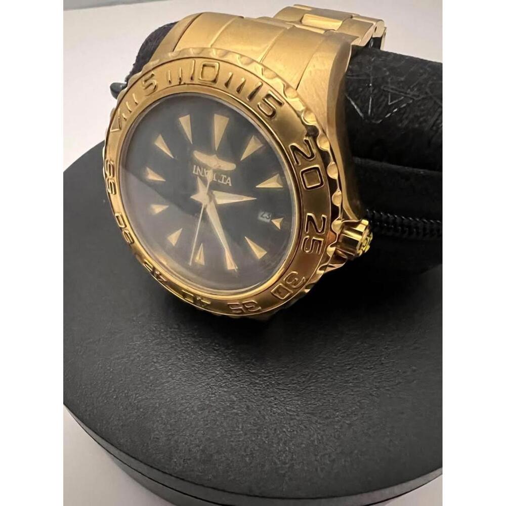 Vintage Invicta  golden tone mechanical, self winding automatic watch